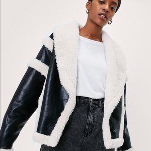 NWT faux leather Sherpa jacket.
